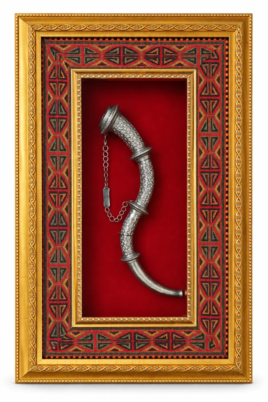 Full view of a framed white metal Narsingha with red backing and patterned patti on white