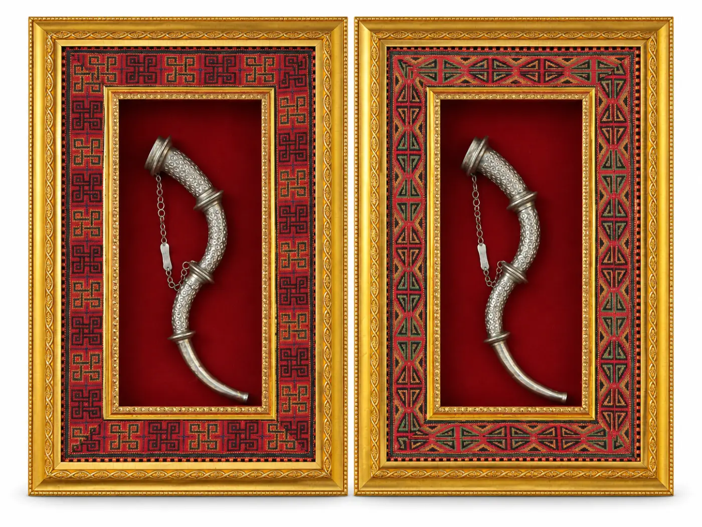 Two separately framed white metal Narsinghas with different woven patti patterns on white